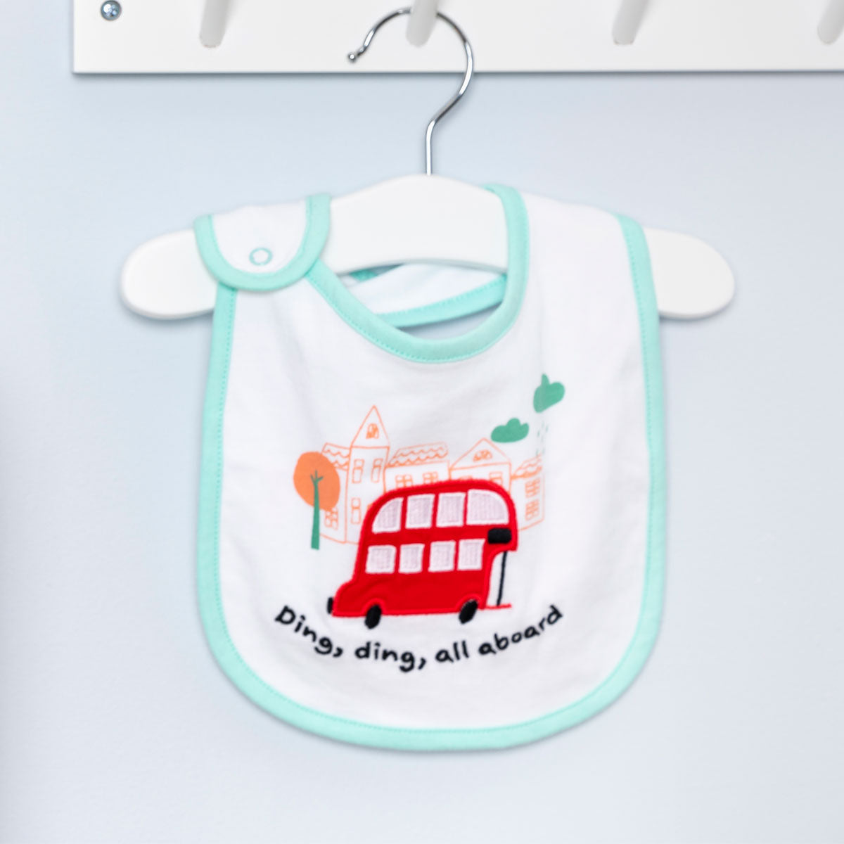 Little Red Bus Baby Bib hanging