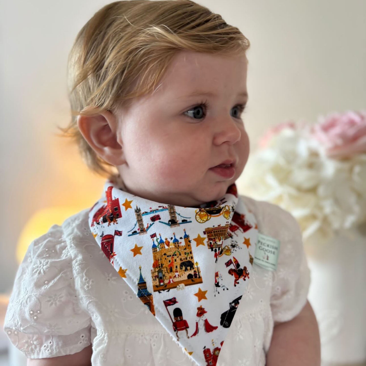Baby wearing Peckish Goose London Organic Baby Bib