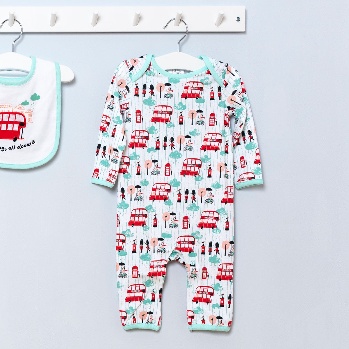 Little Red Bus Baby Romper hanging