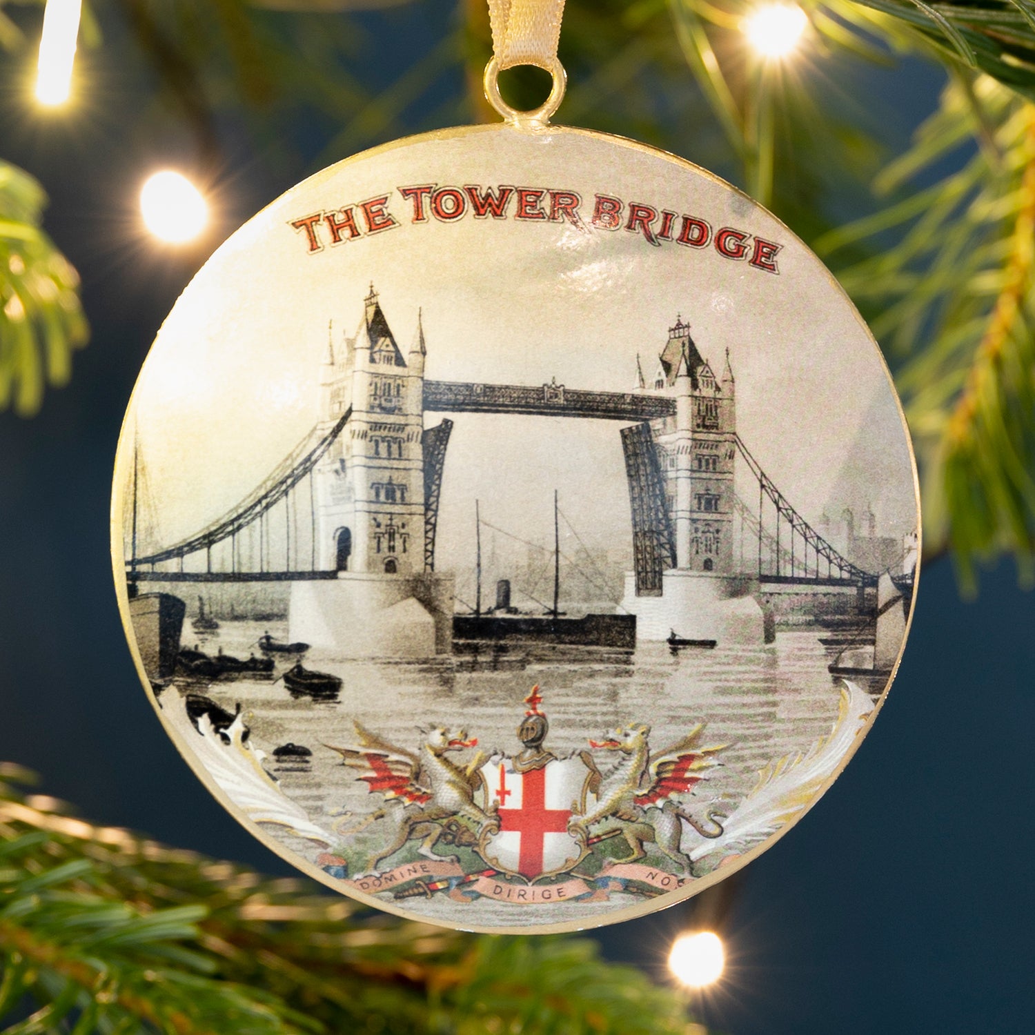 Vintage metal Tower Bridge decoration hanging from Christmas tree
